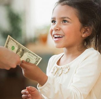 A child accepting a dollar 
