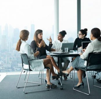 Businesswomen having a meeting in a boardroom 