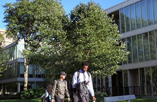 UIC students walking in front of Douglass Hall