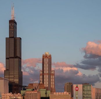 UIC ARC building and the Willis Tower during sunset 