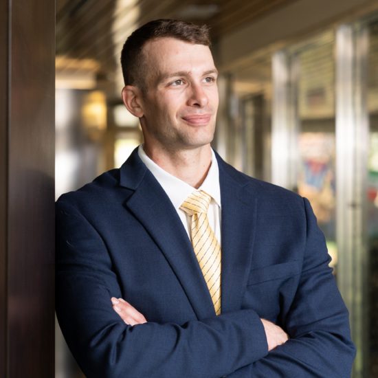 Male student in a suit