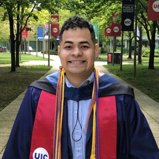 Miguel Torres, MSA UIC Business Student in Regalia